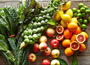 a group of fruits and vegetables on a wood surface Healthy Weight Loss Diets Clifton